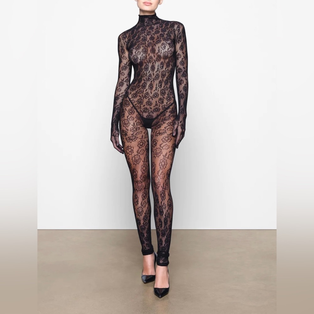 SKIMS: WARP KNIT LACE CATSUIT